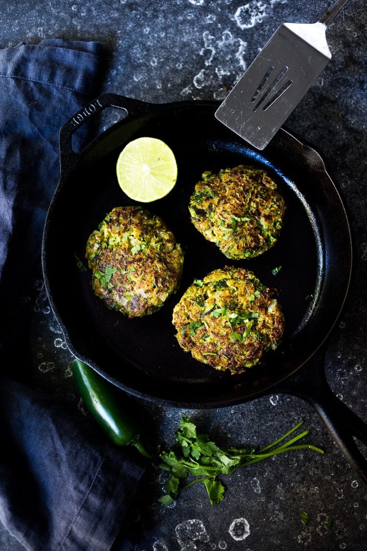 A simple healthy recipe for Zucchini Cakes with Jalapeño and Lime, topped with Chipotle Aioli. Serve this with a leafy green salad for a flavorful vegetarian meal! #zucchinifritters #zucchinicakes #zucchinirecipes