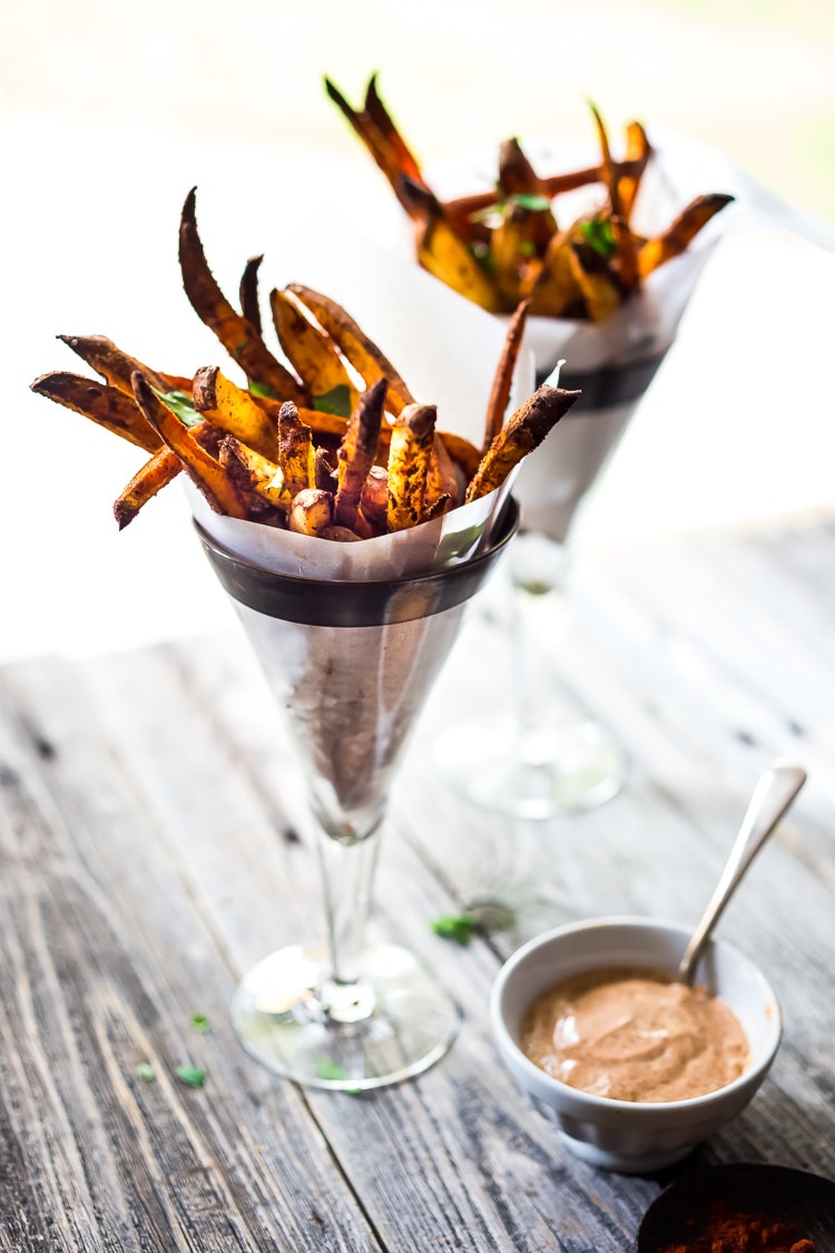 These Sweet Potato Fries can be baked in the oven, or in your air fryer. Healthy, easy and oh-so crispy! Vegan. 