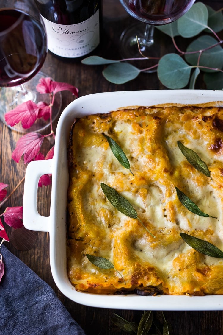 Butternut Lasagna with Wild Mushrooms and Sage- a delicious vegetarian or vegan main dish, perfect for the holiday table! Can be made ahead! #butternutlasagna #veganlasagna #veganthanksgiving #veganmaindish #vegetarianmaindish #mushroomlasaga #veganchristmas #vegandinner #plantbased #cleaneating 