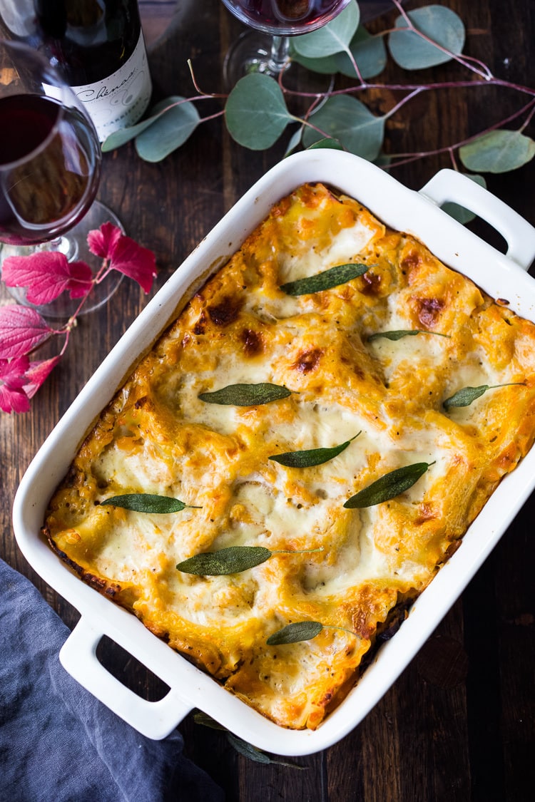 This Butternut Squash Lasagna recipe is a cozy and heartwarming vegetarian meal, made with a creamy roasted butternut squash sauce, no-boil noodles, mushrooms, spinach, ricotta, and sage. Video + Vegan-adaptable. 