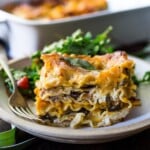 This Butternut Squash Lasagna is a delicious vegetarian meal, perfect for fall. Made with mushrooms, spinach, sage, and easy, no-boil noodles. Vegan adaptable. 