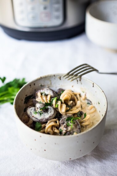 Instant Pot Mushroom Stroganoff - a simple, easy vegetarian weeknight dinner that is creamy, hearty and full of delicious depth and flavor!  Vegan Adaptable! #vegetarian #stroganoff #mushroompasta #veganpasta #instantpotrecipes #instantpot #healthtypasta