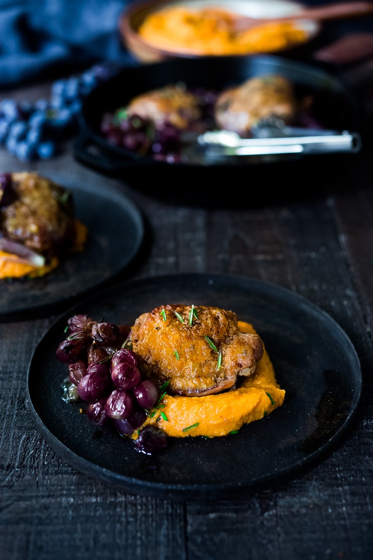 Pan-roasted Chicken with Grapes and Shallots, served over Whipped Ginger Sweet Potatoes - a simple, easy, fall-inspired skillet dinner that can be made in 30 minutes! 