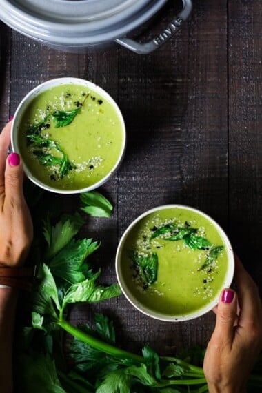 A healing bowl of Celery Soup- comforting, affordable and flavorful, that can be made in  35 minutes. Healthy, delicious and vegan adaptable! #celerysoup #celerysoup #vegan #vegansoup #healthysoup