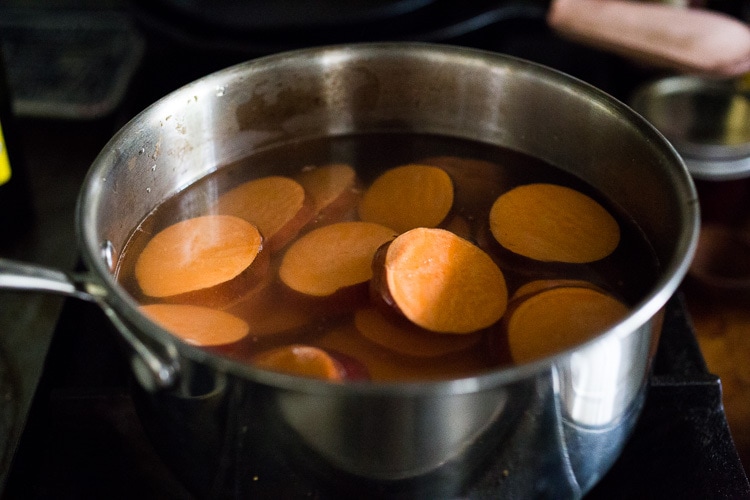 A quick and healthy recipe for Whipped Sweet Potatoes with Ginger - a flavorful vegan side dish that pairs well with fish, chicken or vegan mains. Silky and luscious, these flavorful sweet potatoes can be made in under 30 minutes! #sweetpotatoes #vegan #healthy #mashed 