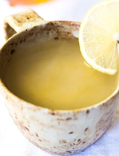 Sore Throat Tea! A homemade tea for sore throat- originating from Morocco, with just three ingredients- lemon, ginger and honey. This healthy, soothing tea remedy is so warming and comforting, you'll want to drink it all winter long! #tea #sorethroatremedy #remedy #tea #gingertea #sorethroattea