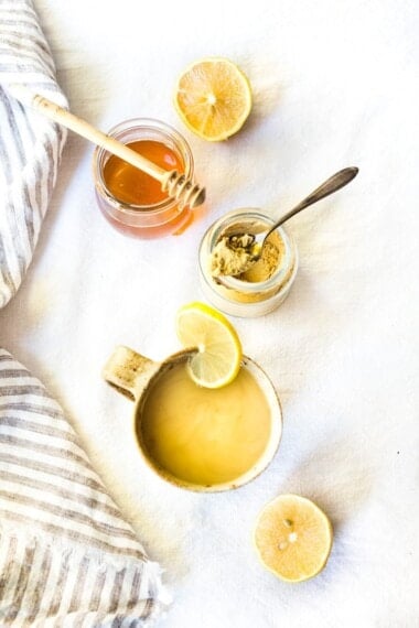 Sore Throat Tea! A homemade tea for sore throat- originating from Morocco, with just three ingredients- lemon, ginger and honey. This healthy, soothing tea remedy is so warming and comforting, you'll want to drink it all winter long! #tea #sorethroatremedy #remedy #tea #gingertea #sorethroattea