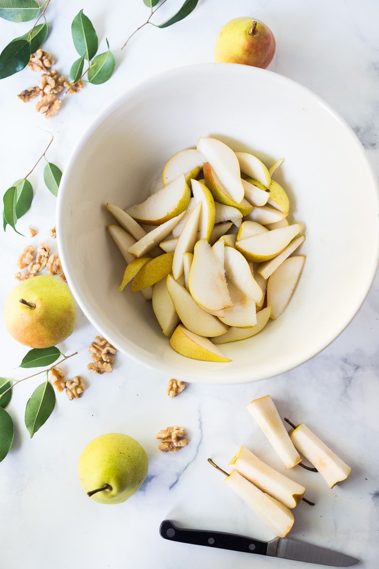 large bowl with sliced pears.