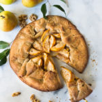 Rustic Pear Galette with Walnut Crust - a cozy fall dessert that is easy to make-  perfect for fall gatherings, holidays and parties. A delicious rustic tart that can be made ahead. #peartart #peardessert #pearrecipes #falldessert #dessert