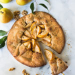 Rustic Pear Galette with Walnut Crust - a cozy fall dessert that is easy to make- perfect for fall gatherings, holidays and parties. A delicious rustic tart that can be made ahead. #peartart #peardessert #pearrecipes #falldessert #dessert