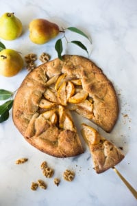  Rustic Pear Galette with Walnut Crust - a cozy fall dessert that is easy to make-  perfect for fall gatherings, holidays and parties. A delicious rustic tart that can be made ahead. #peartart #peardessert #pearrecipes #falldessert #dessert