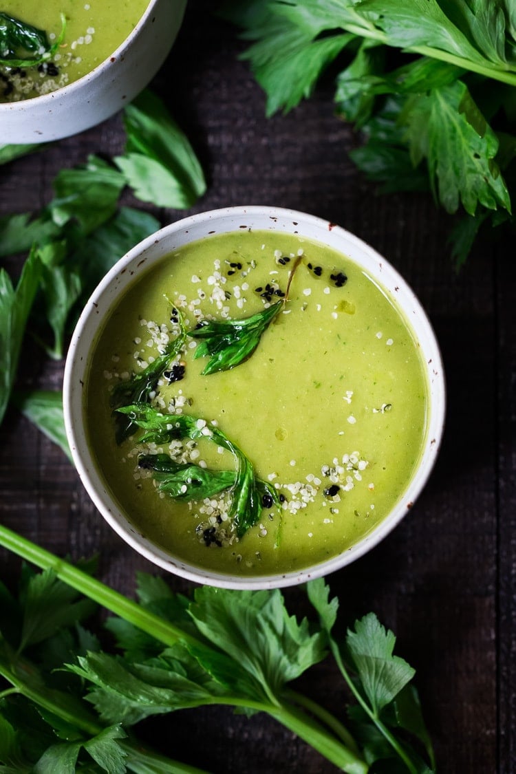 A healing bowl of Celery Soup- comforting, affordable and flavorful, that can be made in  35 minutes. Healthy, delicious and vegan adaptable! #celerysoup #celerysoup #vegan #vegansoup #healthysoup