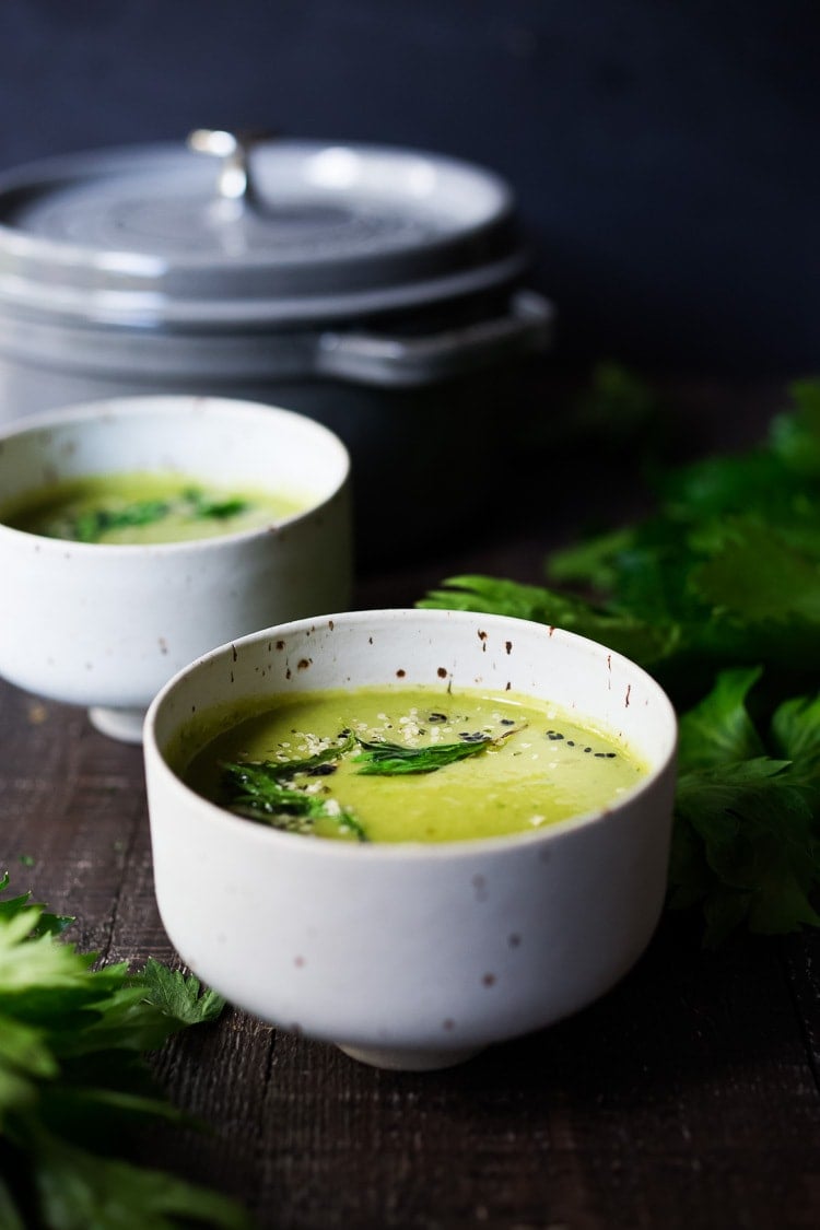 A healing bowl of Celery Soup- comforting, affordable and flavorful, that can be made in  35 minutes. Healthy, delicious and vegan adaptable! #celerysoup #celerysoup #vegan #vegansoup #healthysoup