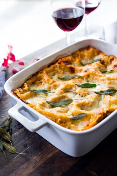 This Butternut Squash Lasagna recipe is a cozy and heartwarming vegetarian meal, made with a creamy roasted butternut squash sauce, no-boil noodles, mushrooms, spinach, ricotta, and crispy sage. Video + Vegan-adaptable.