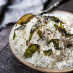 How to cook fluffy, perfectly cooked Basmati Rice, just like they do in India! Finished with an optional- tempering oil this rice is nothing short of delicious! Fast, easy and vegan-adaptable.