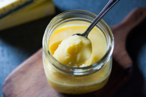 How to make ghee, a simple process that turns butter into the most flavorful foundation for authentic Indian cooking. Removing the milk solids out of butter makes it highly digestible, soothing to the body and according to Ayurvedic medicine, helps balance out the 3 doshas with many health benefits. #ghee #homemadeghee #gheebenifits #gheeuses #howtomakeghee #