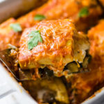 Polenta Lasagna with Roasted Red Pepper Sauce - an easy, vegan adaptable main dish that is perfect for the holiday table. Gluten-free! #veganthanksgiving #polentalasagna #veganlasagna #vegetarianmaindish #veganchristmas #polenta #lasagnarecipes #glutenfreelasagna