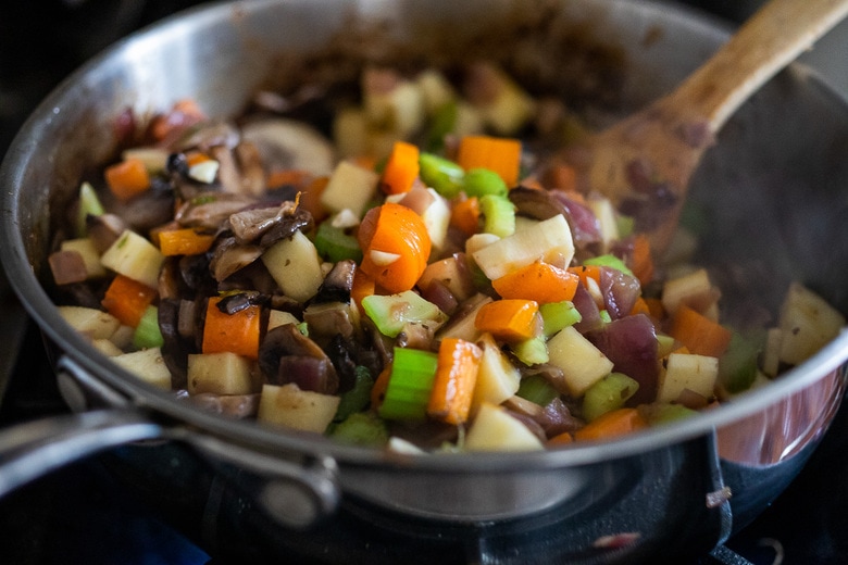 add the root veggies to the pan