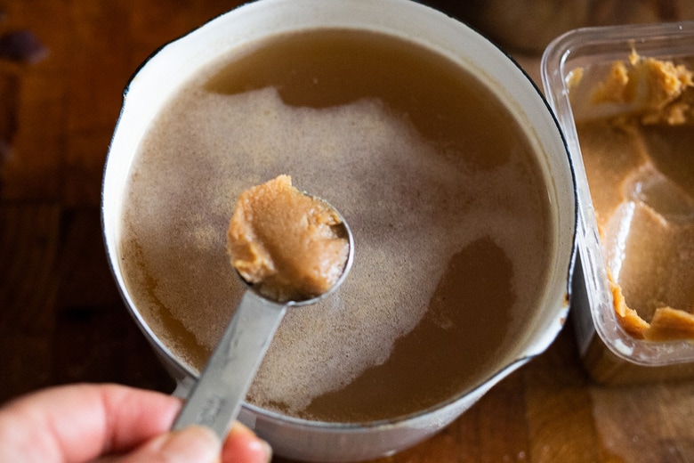 heat broth and add miso