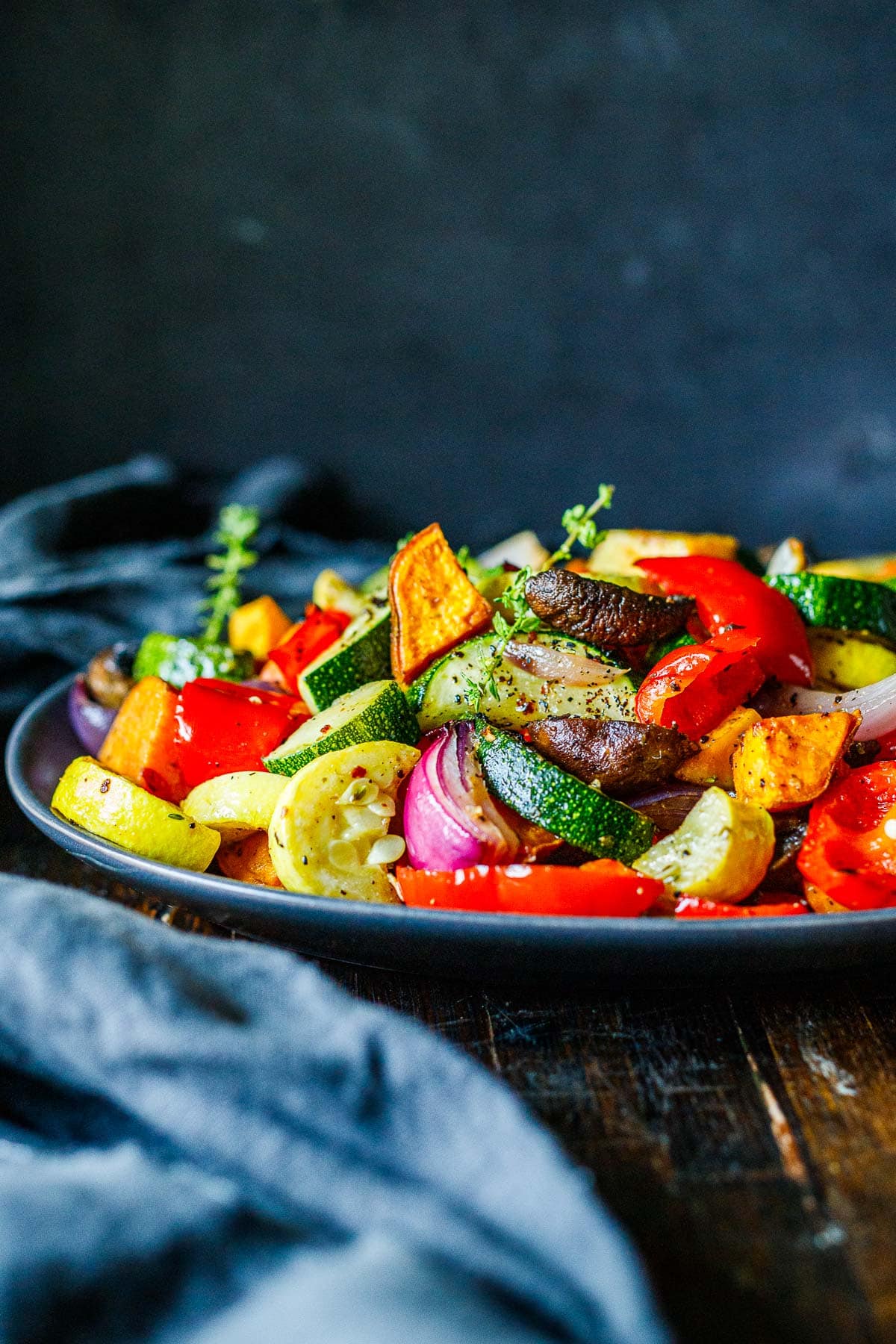 The secret to making Simple Roasted Vegetables in the oven that turn out perfect every time. Easy, fast, and delicious! A healthy side dish that pairs with any meal. Vegan and Gluten-free. 