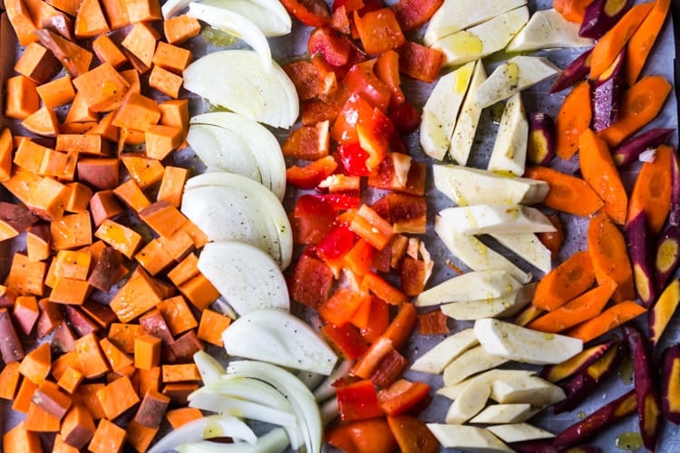 The secret to making Simple Roasted Veggies in the oven that come out perfect every time. Easy, healthy, delicious! Vegan and Gluten-free. #roastedveggies #roastedvegetables #bakedvegetables #vegan #healthy #veganside #glutenfree #feastingathome #sheetpanvegetables 