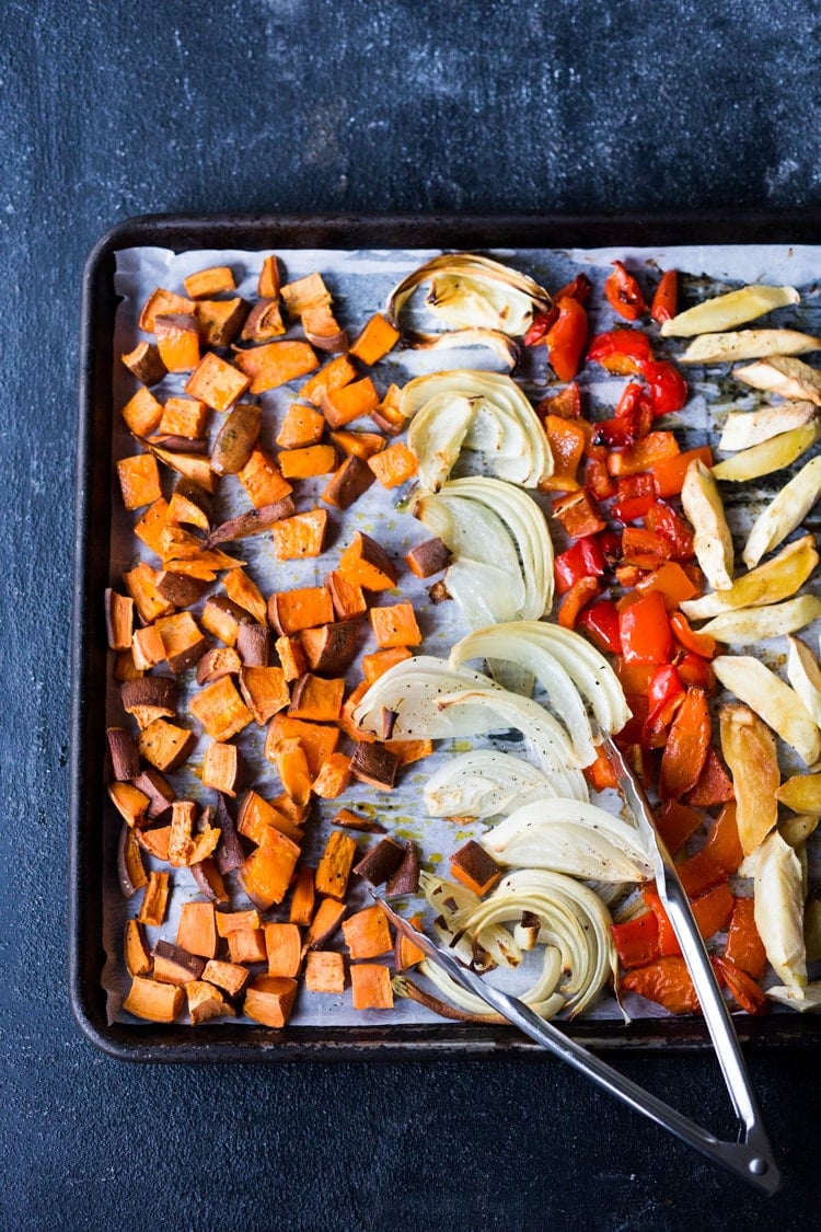 The secret to making Simple Roasted Veggies in the oven that come out perfect every time. Easy, healthy, delicious! Vegan and Gluten-free. #roastedveggies #roastedvegetables #bakedvegetables #vegan #healthy #veganside #glutenfree #feastingathome #sheetpanvegetables 