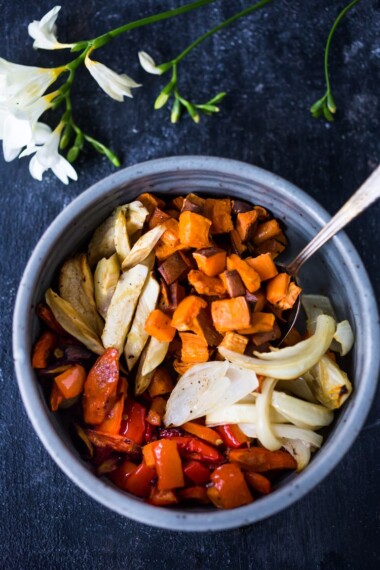 The secret to making Simple Roasted Veggies in the oven that come out perfect every time. Easy, healthy, delicious! Vegan and Gluten-free. #roastedveggies #roastedvegetables #bakedvegetables #vegan #healthy #veganside #glutenfree #feastingathome #sheetpanvegetables