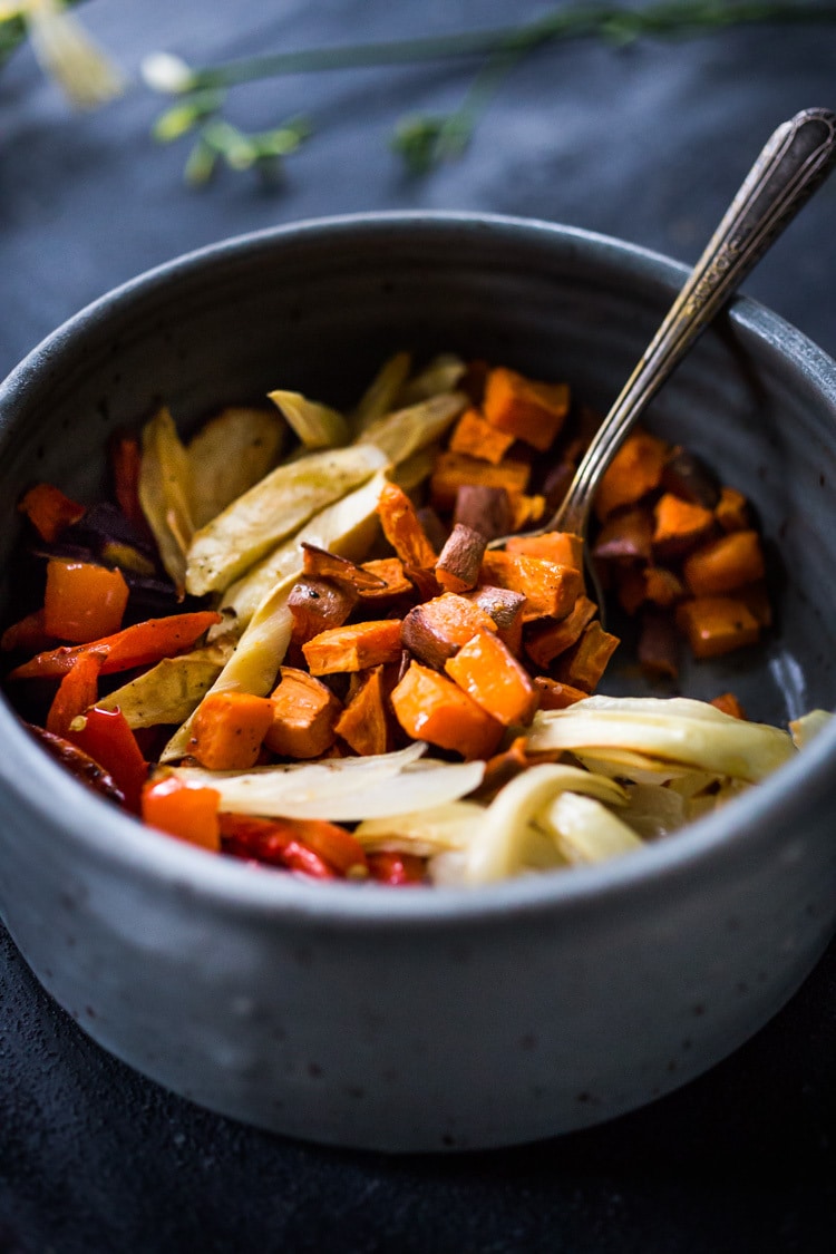 The secret to making Simple Roasted Veggies in the oven that come out perfect every time. Easy, healthy, delicious! Vegan and Gluten-free. #roastedveggies #roastedvegetables #bakedvegetables #vegan #healthy #veganside #glutenfree #feastingathome #sheetpanvegetables 