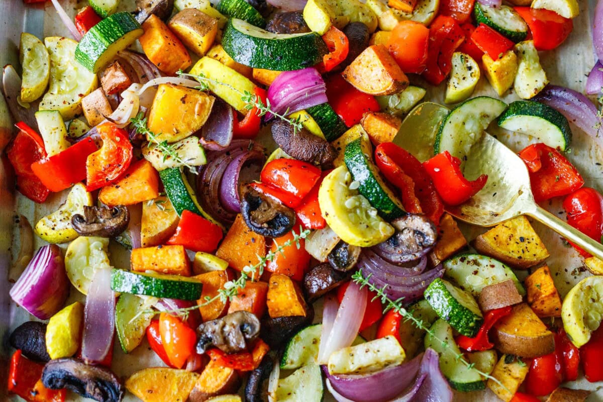 The secret to making Simple Roasted Vegetables in the oven that turn out perfect every time. Easy, fast, and delicious! A healthy side dish that pairs with any meal. Vegan and Gluten-free. 