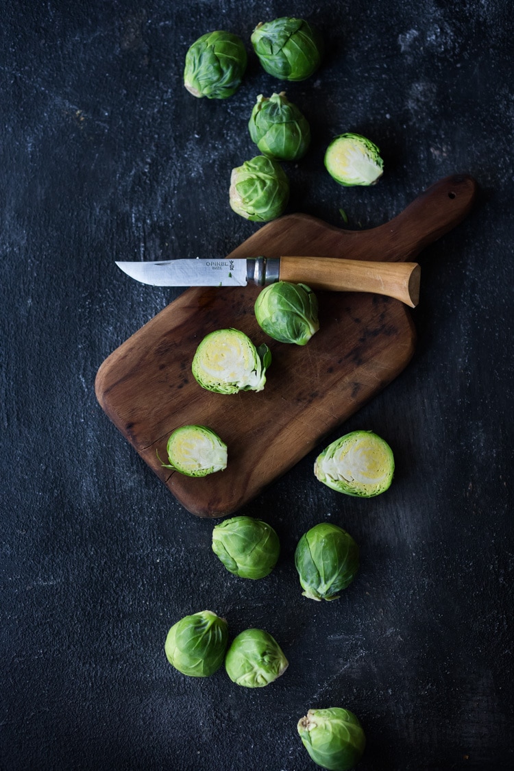 Sheet-Pan Szechuan Chicken (or Tofu) with Brussel Sprouts  takes only 15-20 minutes of hands on time before baking in the oven. A full-flavored weeknight dinner your whole family will love!  #sheetpandinner #szechuanchicken #szechuan #szechuansauce #sheetpanchicken #roastedbrusselsprouts