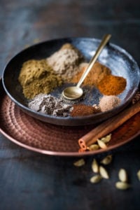 A simple homemade Garam Masala Recipe that can be made in 10 minutes - with ground fragrant spices you already have in your pantry. Easy, healthy and authentic! #garam #garammasala #curry #masala #spices #indianspices #indianrecipes #authenic #masalaspice #indiancurrypowder