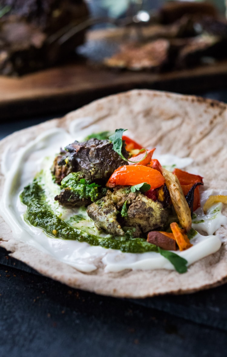 The best recipe for Lamb Shawarma- tender, juicy, leg of lamb, slow roasted in the oven with Middle Eastern Spices until falling apart. Serve this with rice and veggies, or in a pita or wrap! #lambrecipe #Shawarmarecipe #lambshawarmawrap #lambshawarma #fanoflamb #shawarma #authenticshawarma #