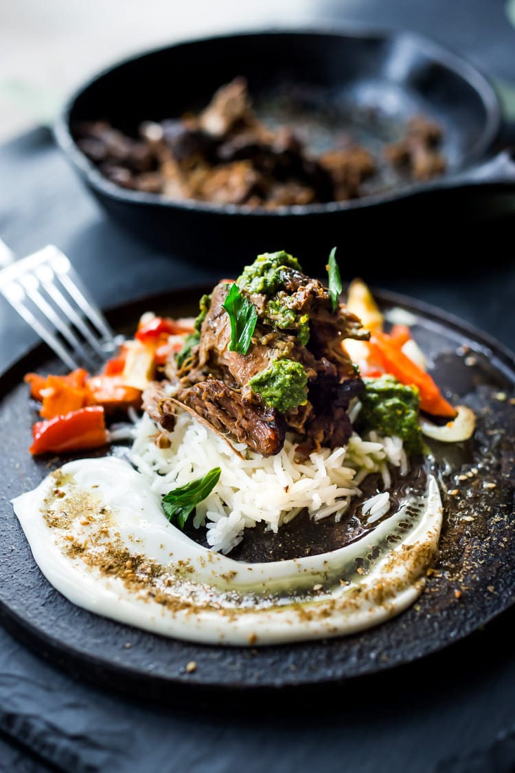 The best recipe for Lamb Shawarma- tender, juicy, leg of lamb, slow roasted in the oven with Middle Eastern Spices until falling apart. Serve this with rice and veggies, or in a pita or wrap! #lambrecipe #Shawarmarecipe #lambshawarmawrap #lambshawarma #fanoflamb #shawarma #authenticshawarma # 