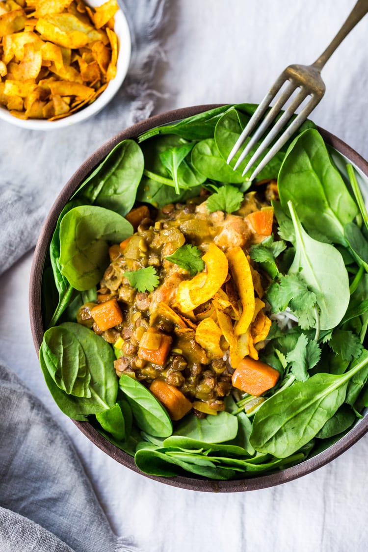 This Creamy Coconut Lentil Curry can be made in an Instant Pot or on the stove top. Infused with fragrant Indian spices, this recipe is not only delicious, it is is vegan and gluten free! #currylentils #indianlentils #lentilcurry #veganlentilcurry #instantpot #vegan #vegancurry #veganlentils #eatclean #cleaneating #plantbased 