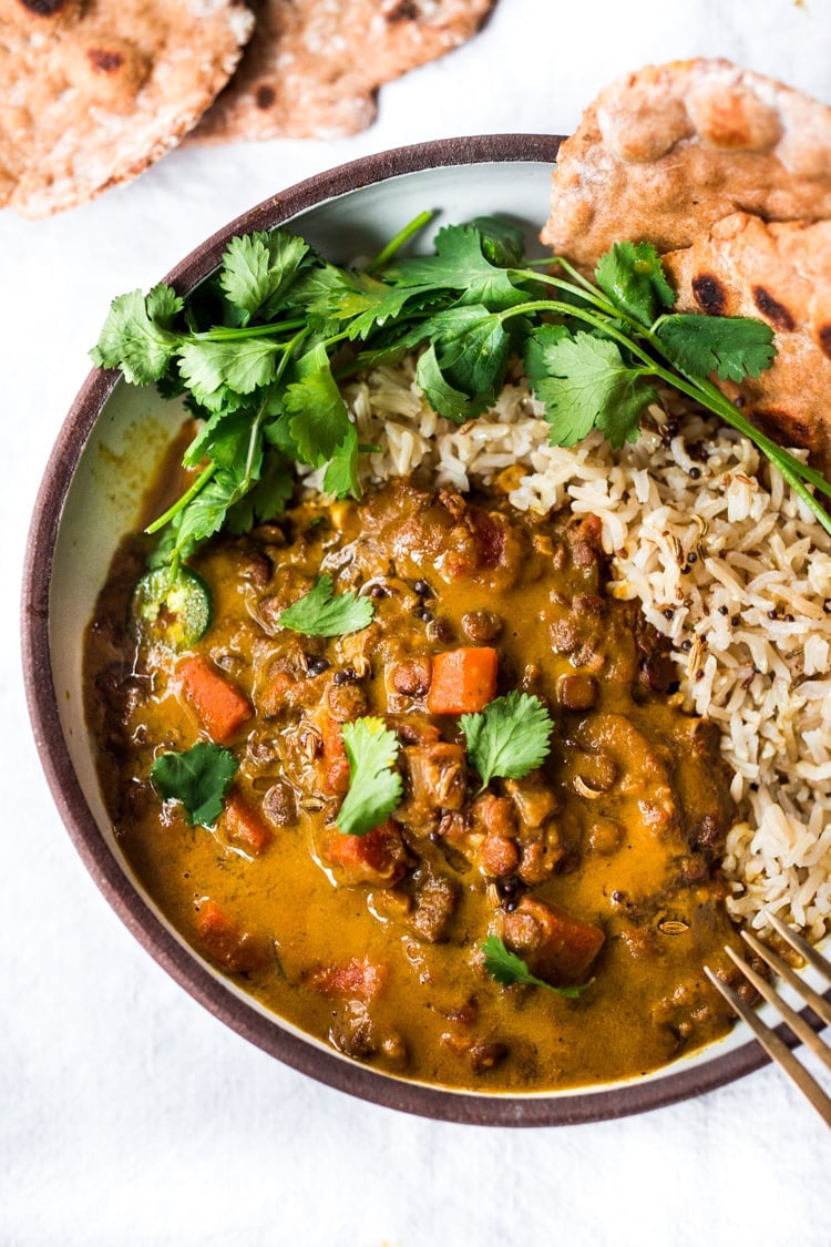 This Creamy Coconut Lentil Curry can be made in an Instant Pot or on the stove top. Infused with fragrant Indian spices, this recipe is not only delicious, it is is vegan and gluten free! #currylentils #indianlentils #lentilcurry #veganlentilcurry #instantpot #vegan #vegancurry #veganlentils #eatclean #cleaneating #plantbased