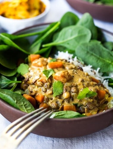 This Creamy Coconut Lentil Curry can be made in an Instant Pot or on the stove top. Infused with fragrant Indian spices, this recipe is not only delicious, it is is vegan and gluten free! #currylentils #indianlentils #lentilcurry #veganlentilcurry #instantpot #vegan #vegancurry #veganlentils #eatclean #cleaneating #plantbased