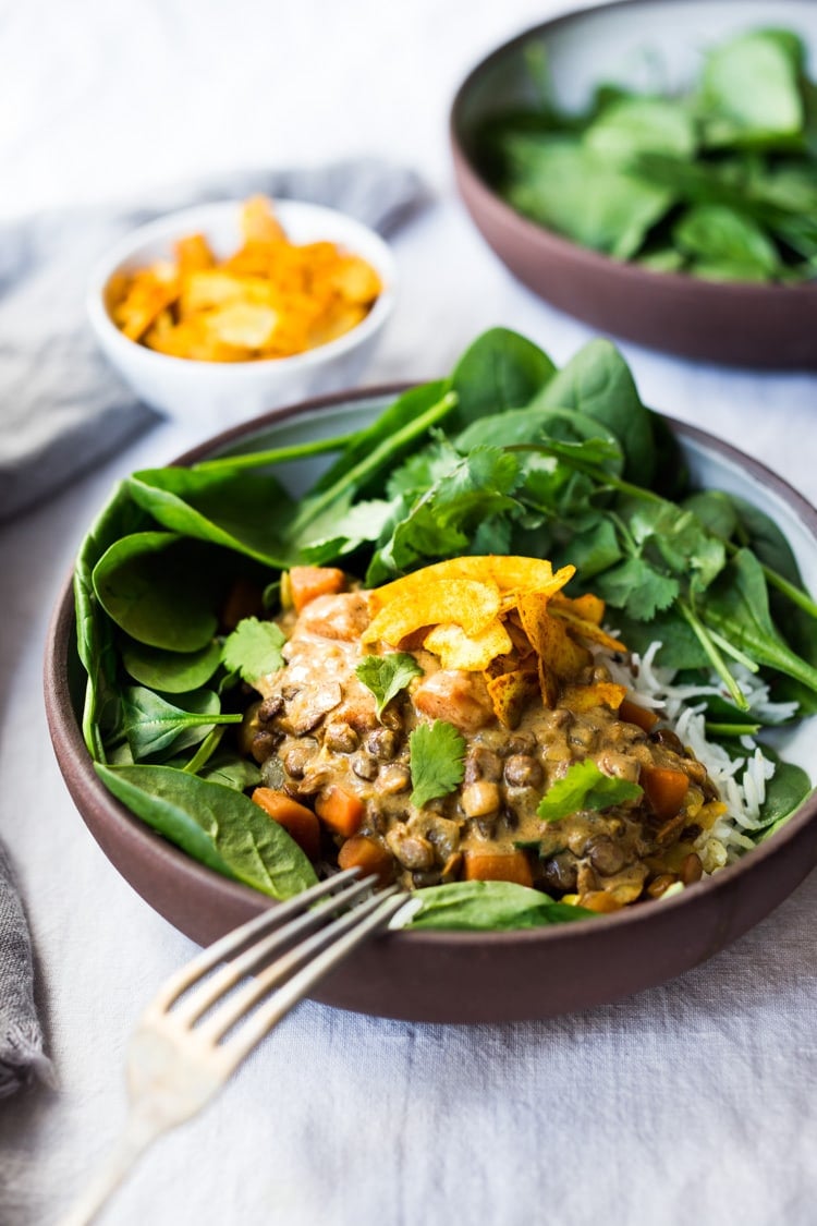 This Creamy Coconut Lentil Curry can be made in an Instant Pot or on the stove top. Infused with fragrant Indian spices, this recipe is not only delicious, it is is vegan and gluten free! #currylentils #indianlentils #lentilcurry #veganlentilcurry #instantpot #vegan #vegancurry #veganlentils #eatclean #cleaneating #plantbased 