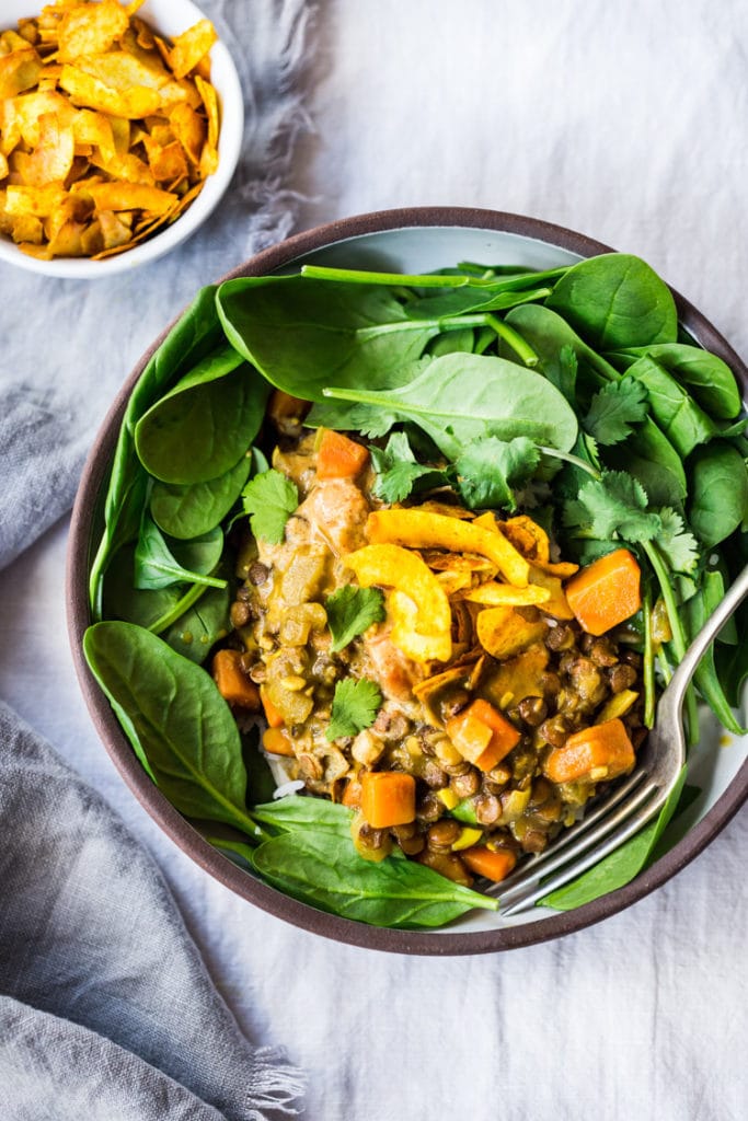 This Creamy Coconut Lentil Curry can be made in an Instant Pot or on the stove top. Infused with fragrant Indian spices, this recipe is not only delicious, it is is vegan and gluten free! #currylentils #indianlentils #lentilcurry #veganlentilcurry #instantpot #vegan #vegancurry #veganlentils #eatclean #cleaneating #plantbased