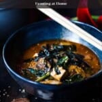 A simple, easy recipe for Kimchi Soup with tofu, mushrooms, and greens that is vegan and gluten-free, adaptable, and can be made in 30 minutes, perfect for weeknight dinners!