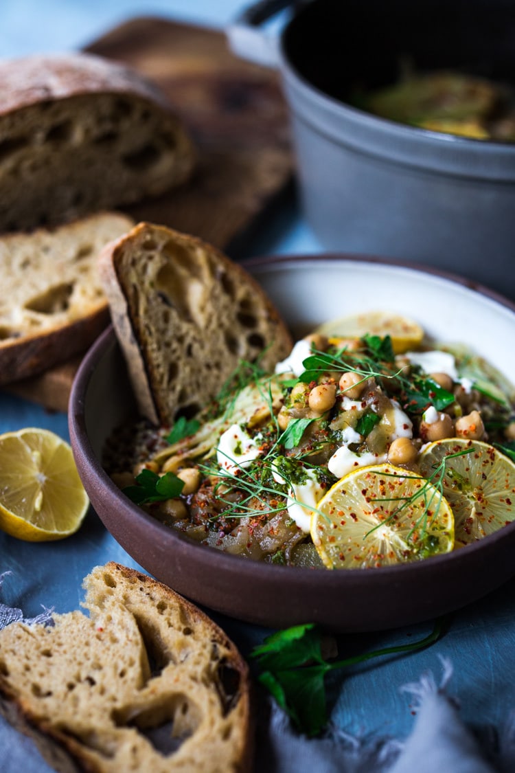 Lemony Chickpea Soup with Fennel & Sumac served over warm quinoa with flavorful Zhoug. A healthy vegan soup, full of flavor! #vegansoup #chickpeasoup #chickpeastew #veganrecipes #plantbased #cleaneating #eatclean #detoxsoup