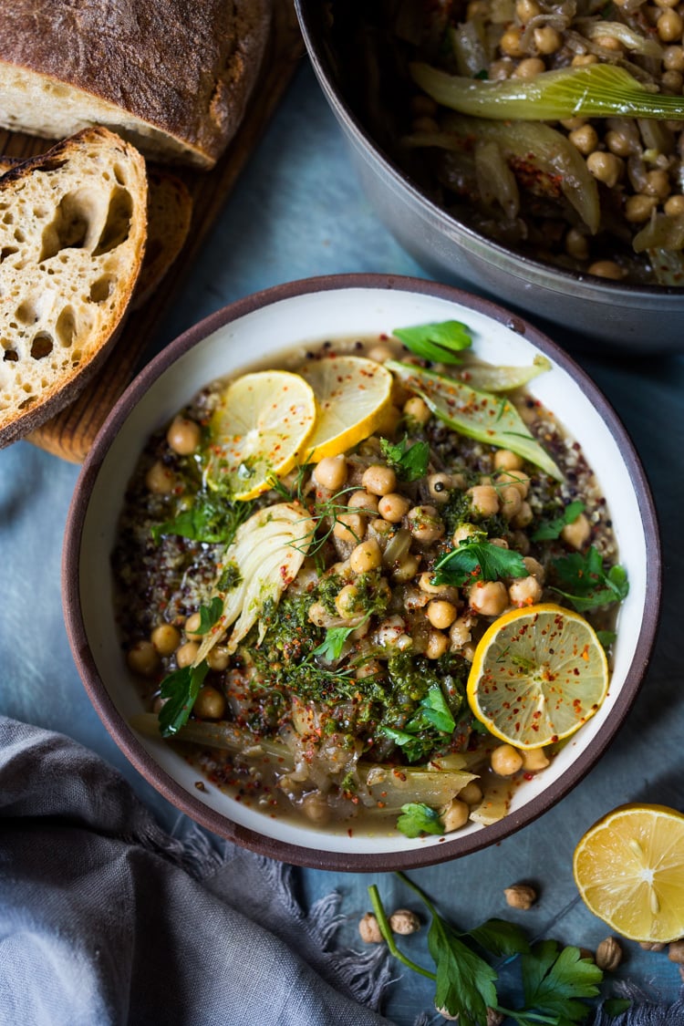 Lemony Chickpea Soup with Fennel & Sumac served over warm quinoa with flavorful Zhoug. A healthy vegan soup, full of flavor! #vegansoup #chickpeasoup #chickpeastew #veganrecipes #plantbased #cleaneating #eatclean #detoxsoup