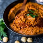 Flavorful Romesco Sauce! You'll find a million uses for this robust & flavorful Spanish condiment. Earthy, smoky and deep, it's made with simple ingredients you probably already have on hand. EASY, Vegan & Gluten-free #romesco #romescosauce #redpeppersauce #vegansauce #spanishrecipes #catalonian #spanishfood #easyromesco #plantbased #cleaneating #vegan #vegansauce
