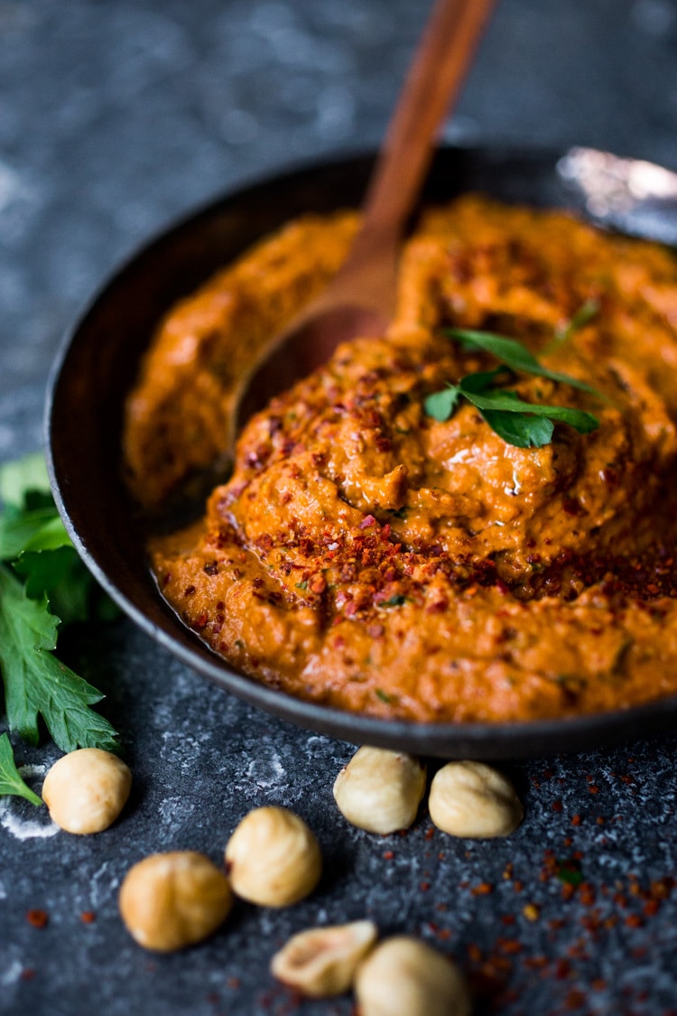 Roasted Parsnips with Romesco Sauce, a simple vegan side dish that is perfect for weeknight dinners or the holiday table! #vegan #veganside #sidedish #healthyside #parsnips #parsniprecipe #roastedparships