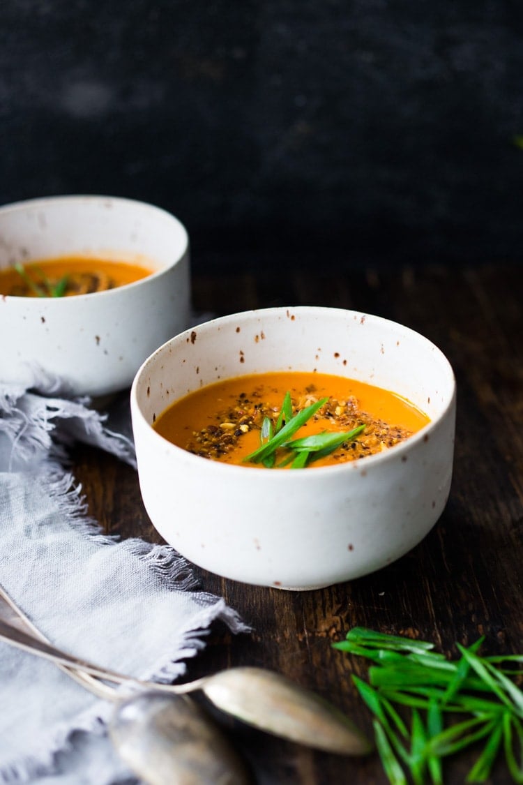 15 Minute Tomato Soup with Coconut and Ginger- a quick vegan tomato soup made with simple pantry ingredients. #vegansoup #tomatosoup #cleaneating #eatclean #veganrecipes #heatlhytomatosoup #quickrecipes #coconutsoup #plantbased #detox 