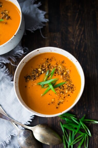 Our 20-minute Tomato Ginger Soup is creamy, vegan and delicious! Made with coconut milk, it's quick and easy tomato soup recipe made with simple ingredients.