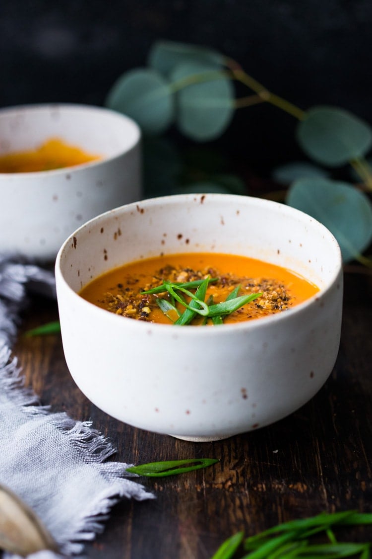 15 Minute Tomato Soup with Coconut and Ginger- a quick vegan tomato soup made with simple pantry ingredients. #vegansoup #tomatosoup #cleaneating #eatclean #veganrecipes #heatlhytomatosoup #quickrecipes #coconutsoup #plantbased #detox 