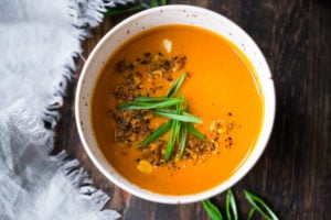 Our 20-minute Tomato Ginger Soup is creamy, vegan and delicious! Made with coconut milk, it's quick and easy tomato soup recipe made with simple ingredients.