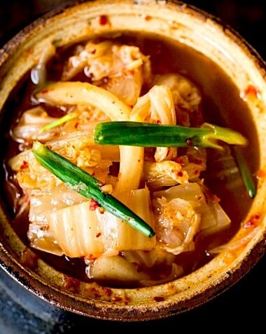 This Kimchi Recipe is quick and easy and takes only  30 minutes of hands-on time before mother nature takes over! Full of healthy, gut-healing probiotics, the benefits of eating kimchi are endless. This authentic kimchi is vegan-adaptable, gluten-free and can be made as spicy or as mild as you like!