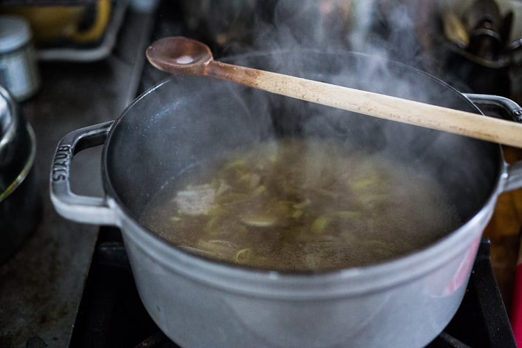 15 Minute Wonton Soup with Lemon Ginger Broth-loaded up with healthy vibrant greens - a fast and easy weeknight diner! #wontonsoup #broth #brothbased #brothysoup 