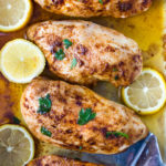 Baked Chicken Breast- a simple easy recipe for perfectly juicy and flavorful chicken breast, roasted in the oven. #chickenbreast #bakedchicken #easychicken #chickenrecipes #roastedchicken